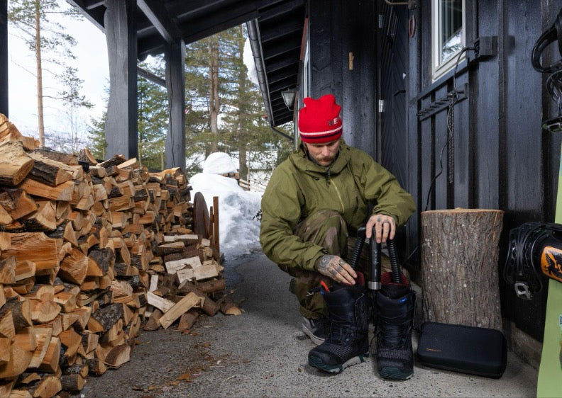Snowboarder Mikkel Bang uses Hedgehog GO dual-purpose dryer to dry his snowboard boots
